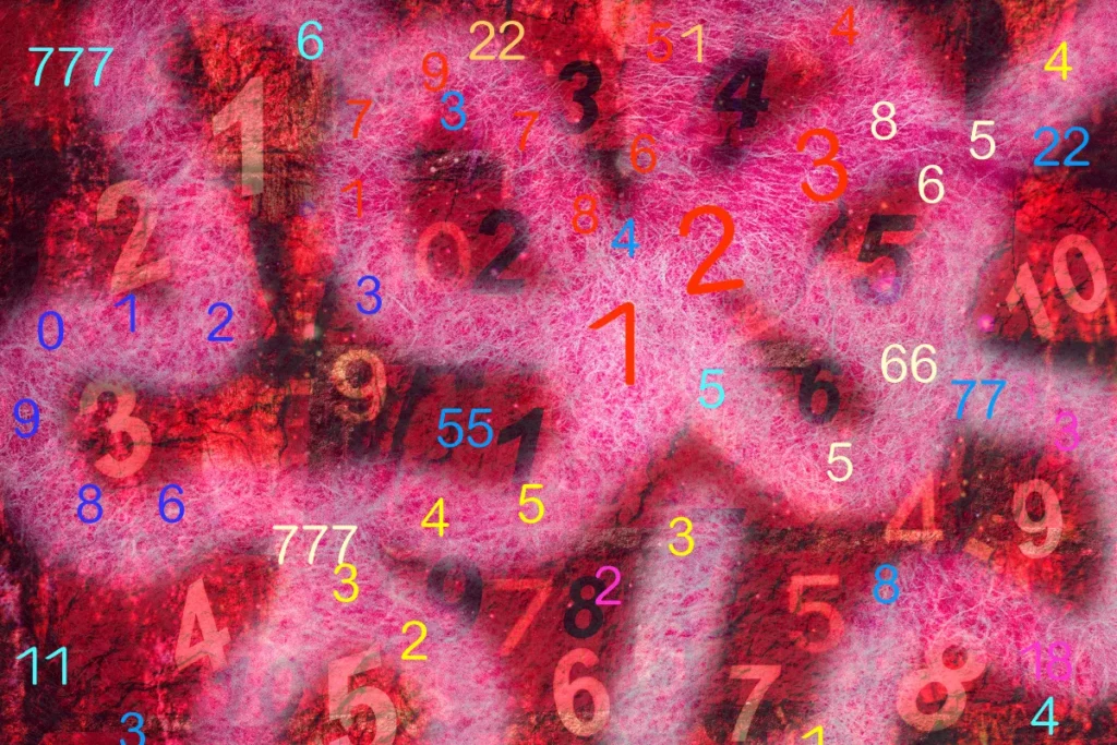 números coloridos espalhados sobre fundo abstrato vermelho com textura intensa